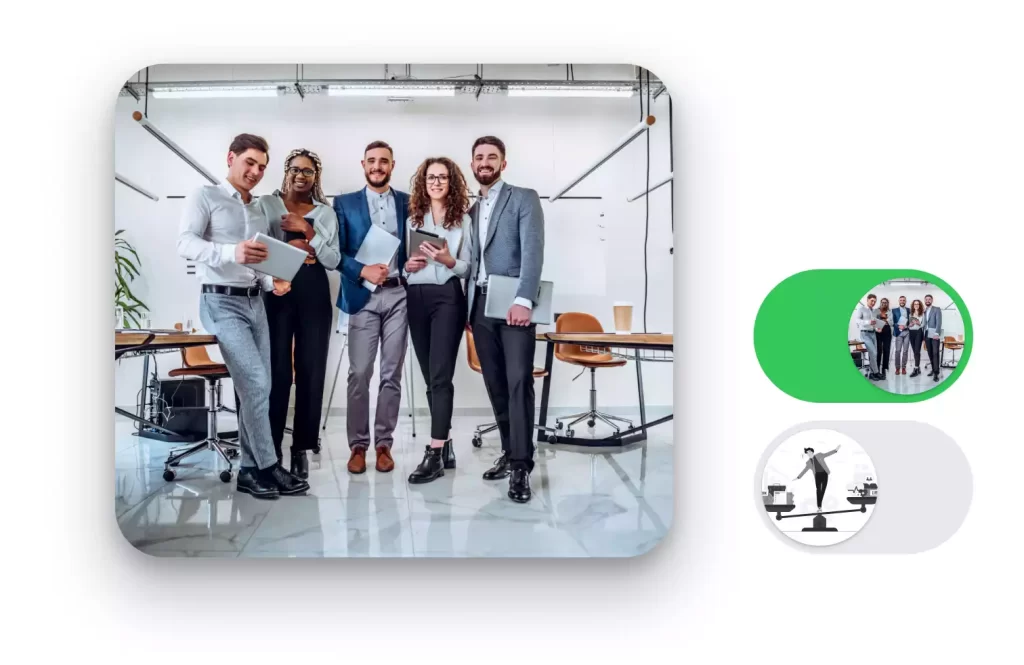 Three males and two females standing in an office facing the camera